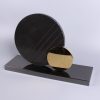 geometric marble and metal sculpture