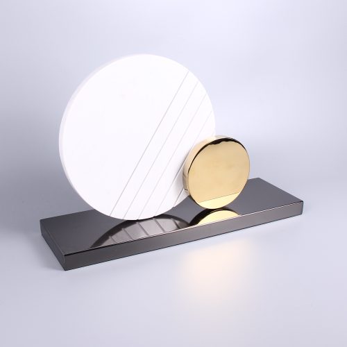 white marble and gold metal abstract sculpture on black base