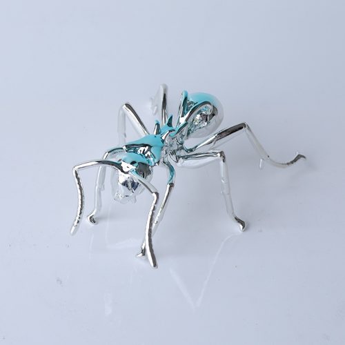 sleek chrome ant sculpture contemporary decor