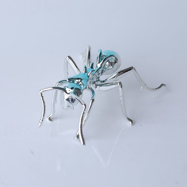 sleek chrome ant sculpture contemporary decor