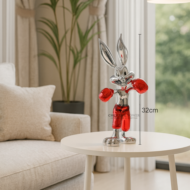 Set of colorful boxing bunny sculptures in chrome finish