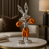 Chrome boxing rabbit orange sculpture on marble table