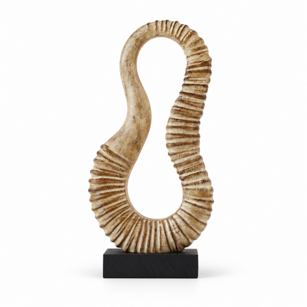 Abstract Ribbed Loop Resin Sculpture – Beige Front Beige abstract ribbed loop resin sculpture on a black rectangular base, front view