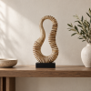 Abstract Ribbed Loop Resin Sculpture – Console Styling Abstract ribbed loop resin sculpture styled on a console table in a neutral interior