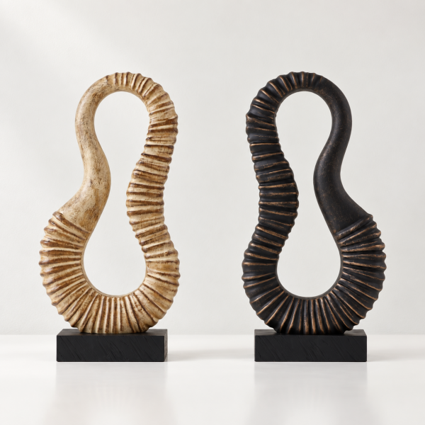 Abstract Ribbed Loop Resin Sculpture – Finish Options Light and dark painted finish options of the abstract ribbed loop resin sculpture displayed side by side