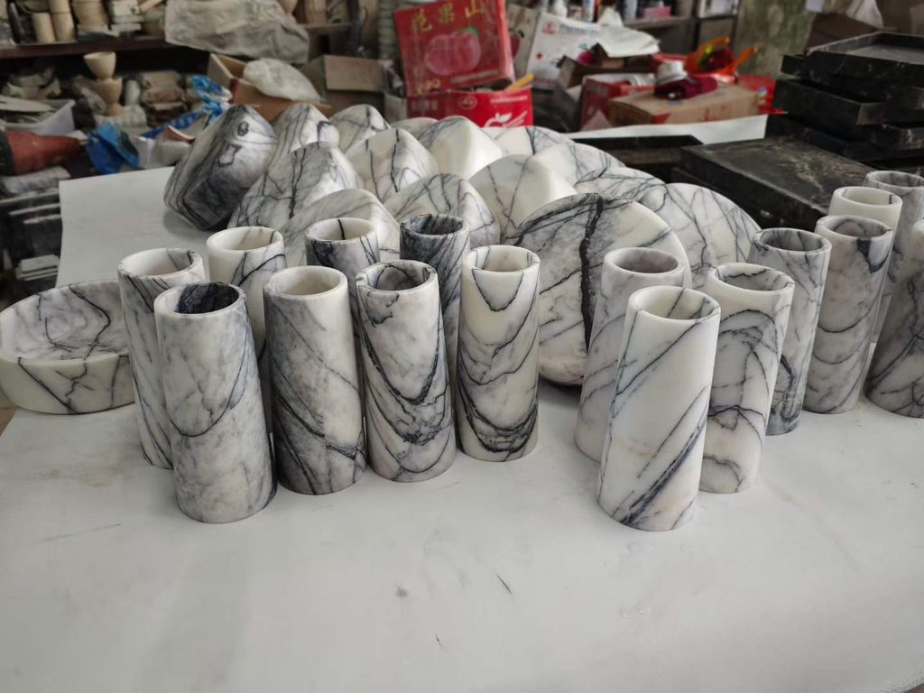 Natural stone cylinder vases with gray and black veining